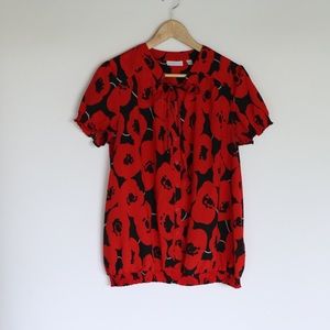 Tie front button down red black blouse